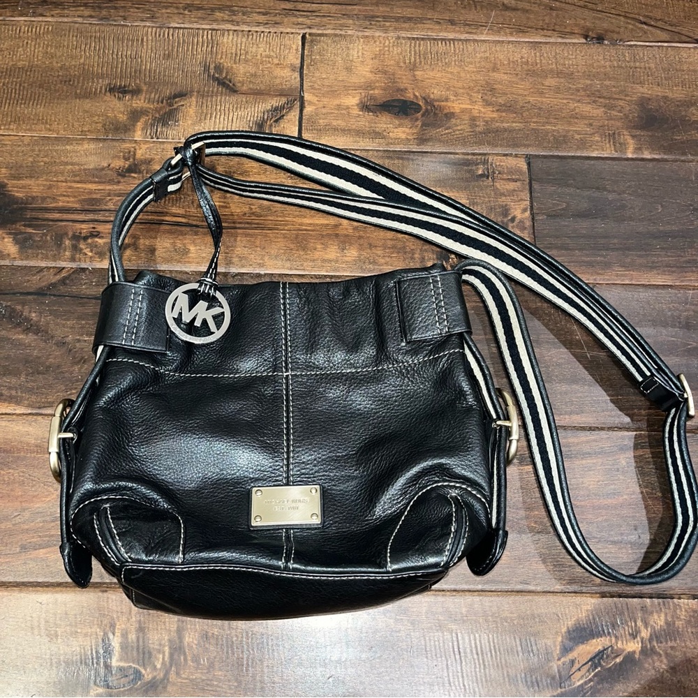 Black leather Michael kors purse with striped strap